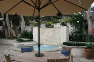 Dry sitting area near the small, classic pool