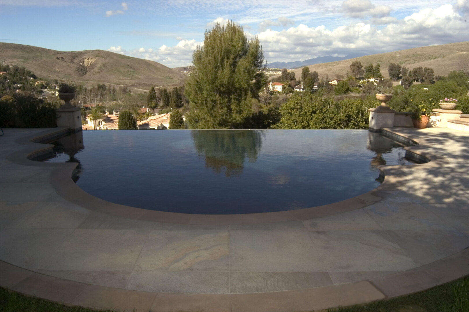 An infinity pool overlooking a mountain (1)