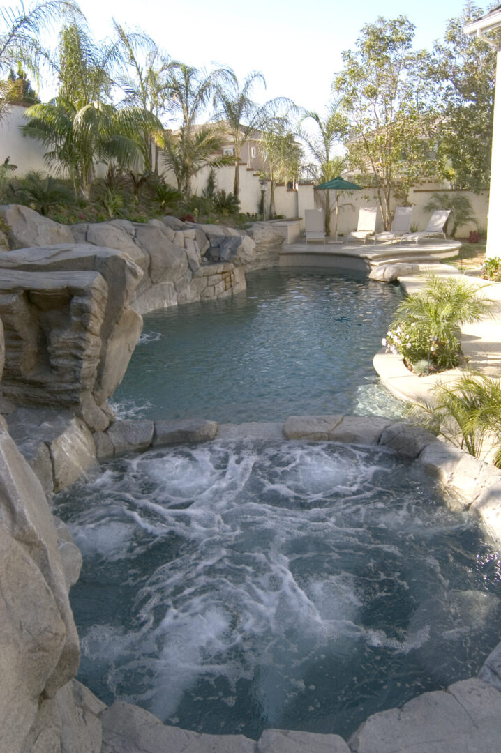 An irregular pool with a smaller, spring-like pool