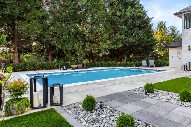 In-ground pool with blue water, showcasing a beautifully constructed swimming pool in Eastvale, CA.